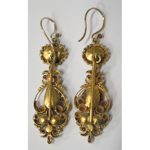 1682 - A Pair of Antique Gold Filigree Pendant Earrings set with pearls and foil backed paste, c. 54mm drop... 