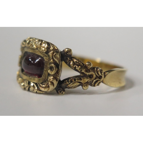 1683 - A Georgian Cabochon Garnet Ring with chased foliate decoration, size L.5, 2.4g