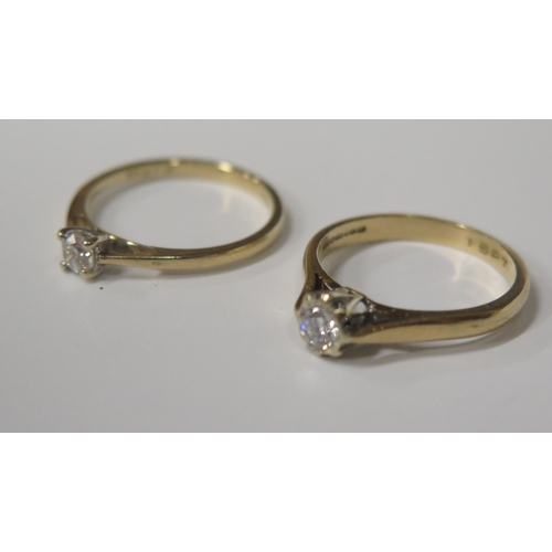 1703 - Two 9ct Gold and Diamond Solitaire Rings, 40pts total, sizes N and M.5, 3.8g