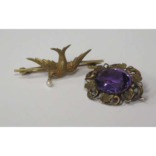 1723 - Two Antique Gold Brooches, one modelled as a bird with pearl and cabochon eye (38mm long) and the ot... 