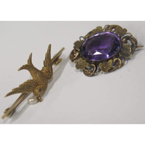 1723 - Two Antique Gold Brooches, one modelled as a bird with pearl and cabochon eye (38mm long) and the ot... 