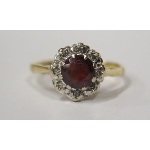 1724 - An 18ct Yellow Gold, Garnet and Diamond Cluster Ring, 10mm diam., size M, 2.8g