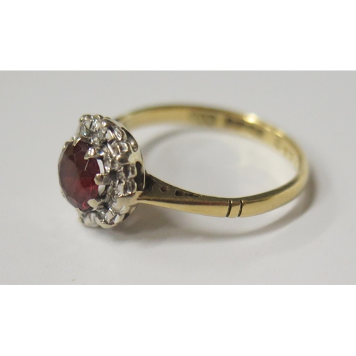 1724 - An 18ct Yellow Gold, Garnet and Diamond Cluster Ring, 10mm diam., size M, 2.8g