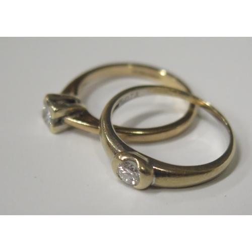 1725 - Two 9ct Gold and Diamond Solitaire Rings, .2ct rub over size L.5 2g and .3ct square cut size L.5 2g