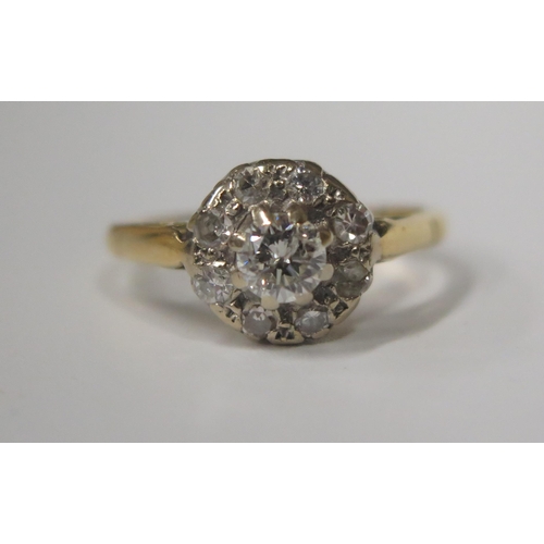 1727 - An 18ct Yellow Gold and Diamond Cluster Ring, central stone 4.5mm, 9.5mm spread, size N, 3.4g