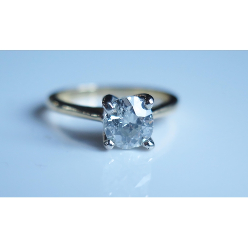 1796 - A 1.45ct Diamond Solitaire Engagement Ring in an 18ct yellow gold setting, size O, 4.9g