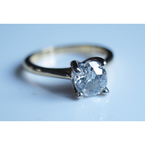 1796 - A 1.45ct Diamond Solitaire Engagement Ring in an 18ct yellow gold setting, size O, 4.9g