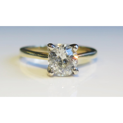 1796 - A 1.45ct Diamond Solitaire Engagement Ring in an 18ct yellow gold setting, size O, 4.9g