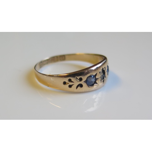 1798 - A Victorian 15ct Gold, Sapphire and Diamond Three Stone Gypsy Ring, Birmingham 1894, size N, 1.5g