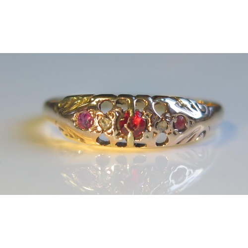 1801 - A 9ct Gold, Ruby and Rose Cut Diamond Ring, size S, 2g