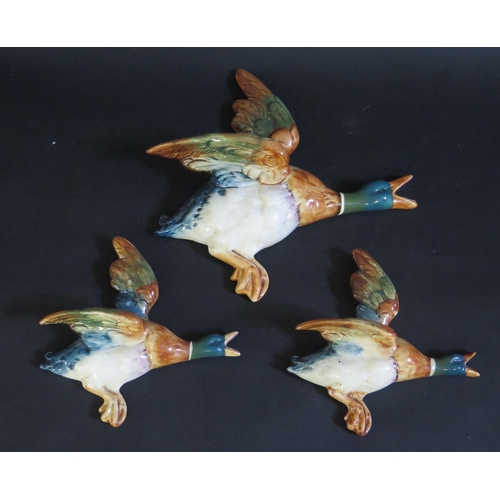 180a - A Set of Three Beswick Flying Duck Wall Plaques: 596-2, 2x 596-4