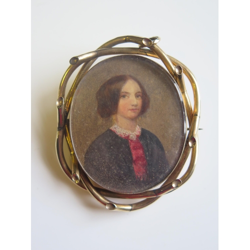 1814 - A Charming Boxed 19th Century Gold Mounted Memorial Brooch decorated with a half length portrait of ... 