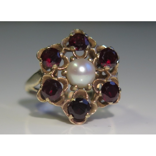 1839 - A 9ct Gold, Six Garnet and Half Pearl Cluster Ring, 18mm head, size M, 3.5ct
