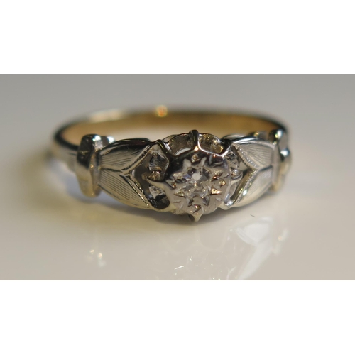 1873 - A 1930's 18ct Gold and Illusion Set Diamond Solitaire Ring, size K.5, 2.4g