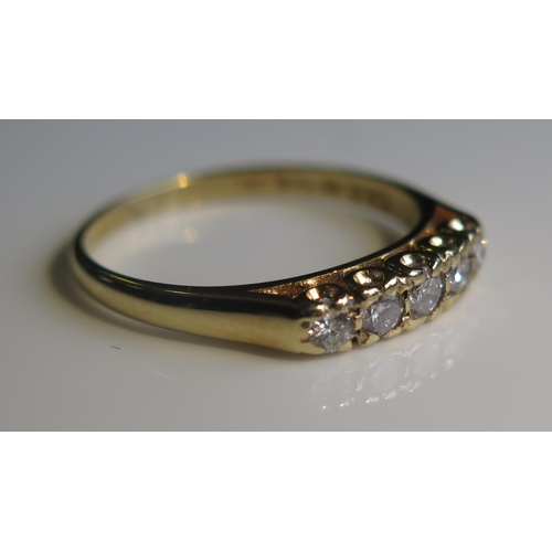 1875 - An 18ct Yellow Gold and Diamond Five Stone Ring, size L.5, 2.2g