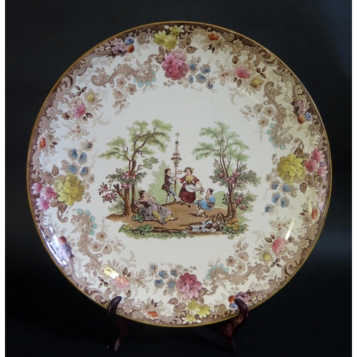 190 - A Mintons Pottery Charger decorated with a Maypole Scene, 38cm diam.