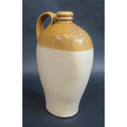 195 - A Stoneware Flagon impressed 'FOSS & SON 20 Bank St NEWTON ABBOTT 6d', 25cm

**TEL BID**