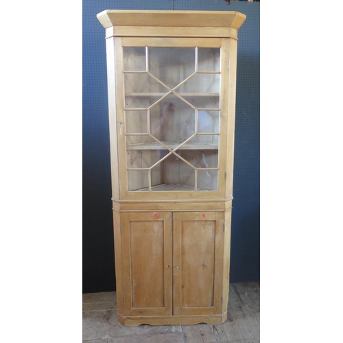208 - Pine Glazed Corner Cabinet.  Glazed double door upper section, Two door base.  H. 209cm, W. 82cm, D.... 