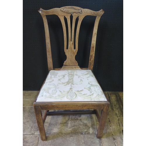 252 - Antique Carved Oak Chair.  The top with naive carved Fish.  H. 97cm, W. 52cm, D. 51cm