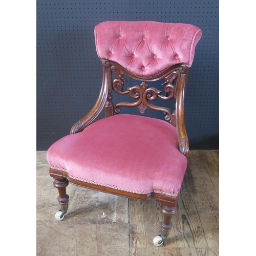 261 - Antique Carved Wood Chair.  Upholstered Seat and Backrest.  On Pottery Castors.