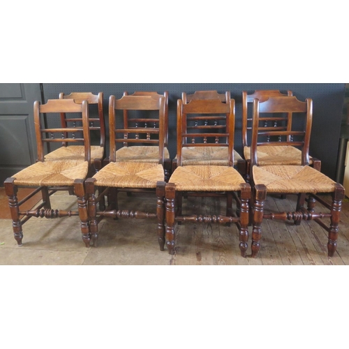 264 - Set of Eight Antique Wood Chairs.  Turned front Legs.  Rush bound Seats.