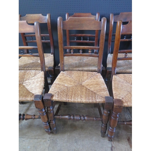 264 - Set of Eight Antique Wood Chairs.  Turned front Legs.  Rush bound Seats.