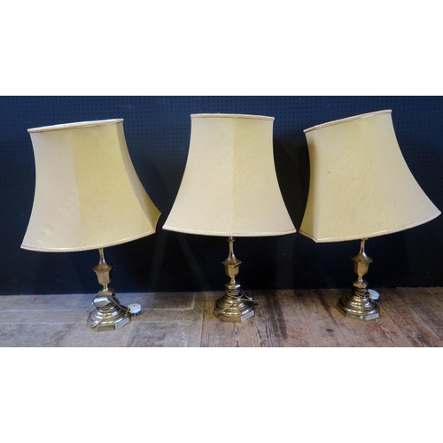 272 - Set of Three Lamps with Brass Bases.  Each with matching Shade.  Height including the Shade, 76cm.