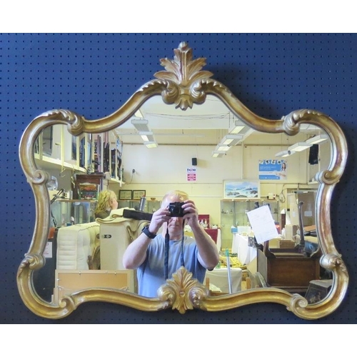 326 - Decorative Carved Gilded Wood Framed Mirror.  81 x 70cm