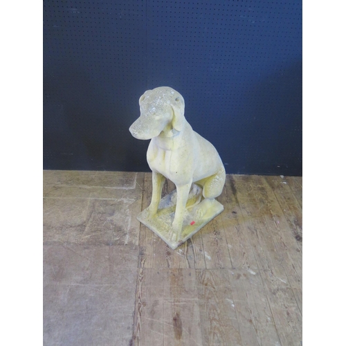 332 - Composite Stone Garden Figure of a Seated Dog.  71cm tall.