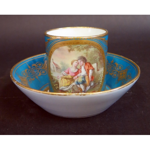 350A - An 18th Century Sevres Porcelain Coffee Can decorated with a cartouche of an amorous couple and with... 