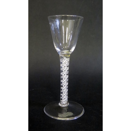404 - An 18th Century Cordial Glass with opaque twist stem, broken pontil, 14.5cm