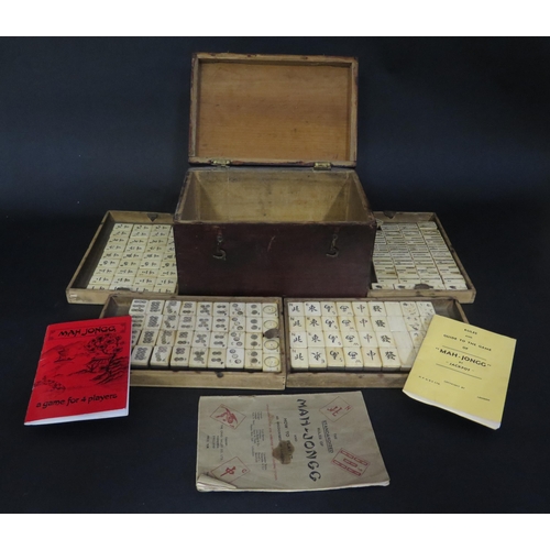 422 - Wood Cased Mahjong Set.  Hinged lid with five trays containing Bone and Wood markers.  25.5cm long