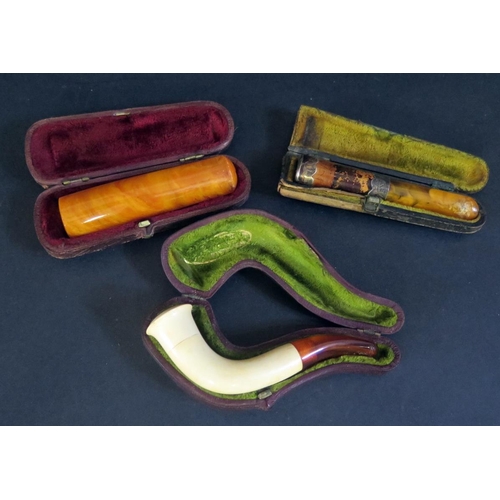 511 - Three Cheroot Holders (two cased, on silver banded one 9ct gold collar) and cased Meerschaum pipe