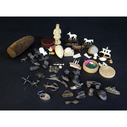 519 - A Collection of 19th Century Bone and Ivory Miniatures, white metal charms, early Monopoly pieces, e... 