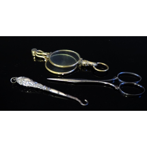 520 - A Gilt Lorgnette, silver handled glove hook and pair of early scissors by Osborn