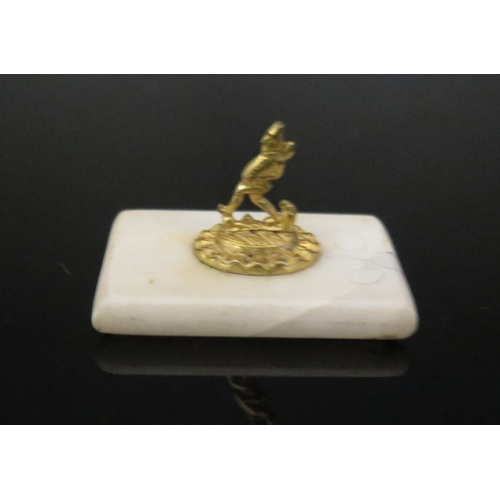 535 - A Small 19th Century Paperweight with gilt metal finial modelled as a walking man, 39mm