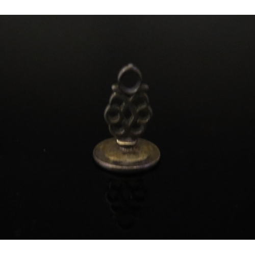 537 - An Early White Metal Seal, 21mm tall