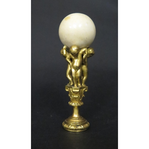 539 - A Fine 19th Century Gilt Bronze and Ivory Mounted Seal formed as three putti bearing an ivory ball c... 