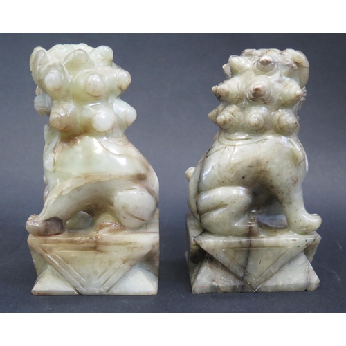 640A - A Pair of Chinese Carved Jade Male and Female Foo Dogs, 13.5cm high