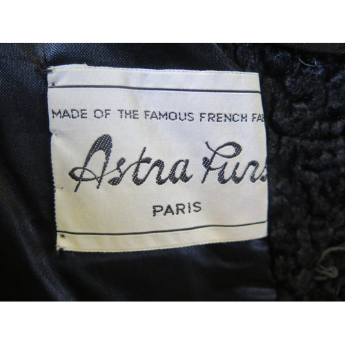 745 - An Astrakhan Coat by Astra Furs of Paris and one other by Sacks & Biendlor