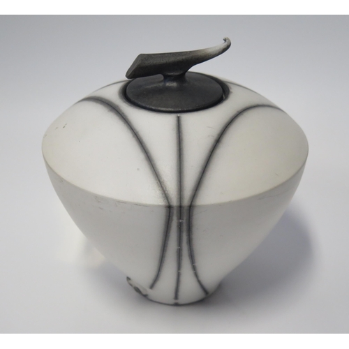 128 - Tim Andrews, Studio Pottery Lidded Ovoid Raku Vase, 15.5cm high. Sold with 2003 receipt No. 222 Resi... 