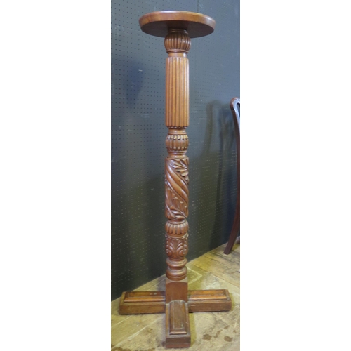 250a - A Carved Mahogany Torchère