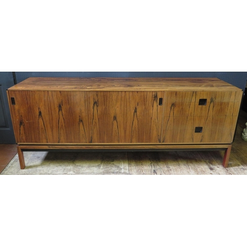 256f - A Danish Control Rosewood Veneered Sideboard with ebony shoulders and handles, 192(w)76(h)x49(d)cm