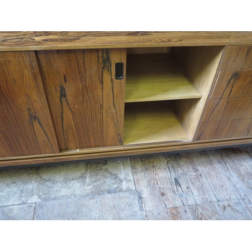 256f - A Danish Control Rosewood Veneered Sideboard with ebony shoulders and handles, 192(w)76(h)x49(d)cm