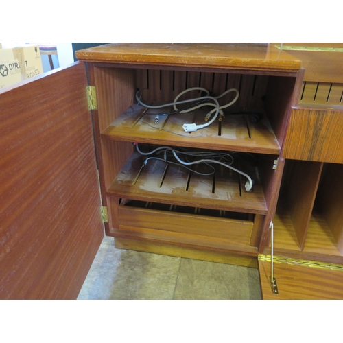 256g - A Danish Rosewood Veneered Stereo Cabinet with central hinged record player compartment with record ... 