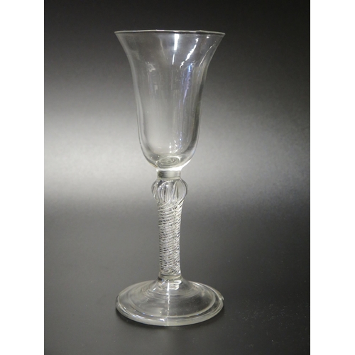 407 - A Large 18th Century Drinking Glass with air twist stem and folded foot, 20.5cm tall