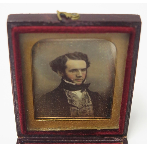 591 - A Cased 19th Century Tinted Daguerreotype 5x4cm, carte de visite, Leuchars leather card case, etc.