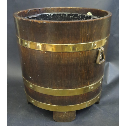 765 - A Copper Bound Oak Log Basket with A, Lister & Co. Ltd. Maker's label, 38(h)x37(diam.)cm