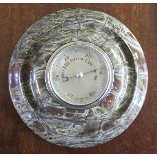 312 - 20th Century Barometer Mounted within Cornish Serpentine Base.  21cm diameter.