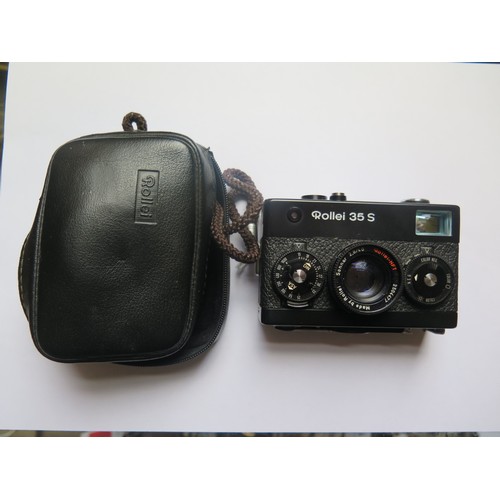 308a - A Rollei 35S Camera In Original Leather Case
